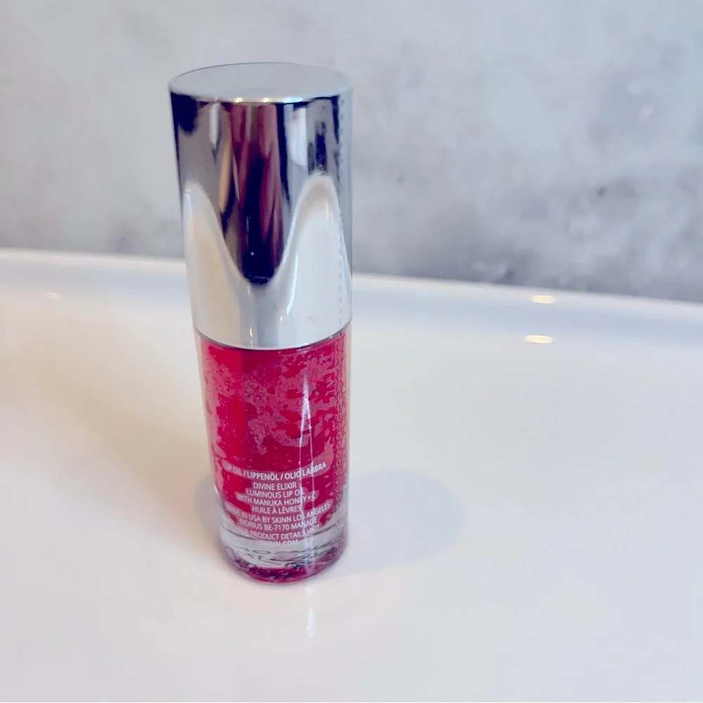 NWT- SKINN Divine Elixir - Scarlet Luminous Lip Oil Crimson